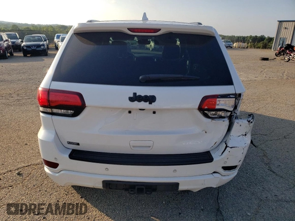 2017 Jeep Grand Cherokee Altitude with VIN 1C4RJEAG9HC702812, listed as a Copart auction lot 62423495 with 162,982 mi miles and Salvage title. Bid and sale history available at DreamBid. Image 6.