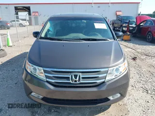 2013 Honda Odyssey Touring with VIN 5FNRL5H98DB080296, listed as a IAAI auction lot 42461843 with 104,901 mi miles and . Bid and sale history available at DreamBid. Image 12.