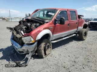 2002 Ford F-350 XL with VIN 1FTSW31FX2EC47303, listed as a Copart auction lot 63403065 with 129,210 mi miles and Salvage title. Bid and sale history available at DreamBid. Image 1.