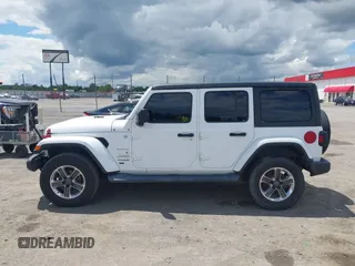 2019 Jeep Wrangler Unlimited Sahara with VIN 1C4HJXEN7KW535887, listed as a IAAI auction lot 42217440 with 91,226 mi miles and . Bid and sale history available at DreamBid. Image 15.