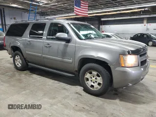 2007 Chevrolet Suburban LTZ with VIN 1GNFK163X7J231365, listed as a Copart auction lot 60885135 with 208,687 mi miles and Salvage title. Bid and sale history available at DreamBid. Image 4.