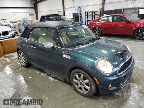 2010 MINI Convertible S with VIN WMWMS3C54ATY51980, listed as a Copart auction lot 56589265 with 147,136 mi miles and Salvage title. Bid and sale history available at DreamBid. Image 4.