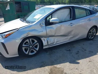 2021 Toyota Prius L Eco z VIN JTDKAMFU5M3137298, wystawiony jako IAAI lot #42270937 z przebiegiem 38 828 mil mil oraz . Historia ofert i sprzedaży dostępna na DreamBid. Obrazek 6.