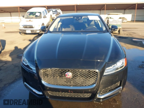 2018 Jaguar XF with VIN SAJBE4EV4JCY56439, listed as a IAAI auction lot 41390873 with 59,599 mi miles and . Bid and sale history available at DreamBid. Image 13.