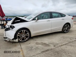 2018 Ford Fusion Titanium z VIN 3FA6P0K96JR109412, wystawiony jako Copart lot #60421195 z przebiegiem 120 857 mil mil oraz Szkoda całkowita • Salvage title. Historia ofert i sprzedaży dostępna na DreamBid. Obrazek 1.