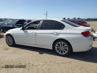 2018 BMW 3 Series 320i with VIN WBA8A9C5XJAH13799, listed as a Copart auction lot 53917375 with 104,635 mi miles and Salvage Title. Bid and sale history available at carsss.com. Image 2.