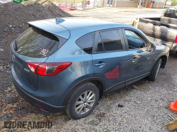 2016 Mazda CX-5 Touring with VIN JM3KE4CY5G0771252, listed as a IAAI auction lot 42138637 with 106,767 mi miles and . Bid and sale history available at carsss.com. Image 4.