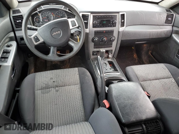 2010 Jeep Grand Cherokee Laredo with VIN 1J4PR4GKXAC120224, listed as a Copart auction lot 88764805 with 153,742 mi miles and Salvage Title. Bid and sale history available at carsss.com. Image 8.