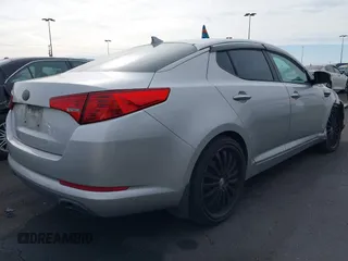 2013 Kia Optima LX with VIN KNAGM4A75D5430974, listed as a IAAI auction lot 41209055 with 197,871 mi miles. Bid and sale history available at carsss.com. Image 4.