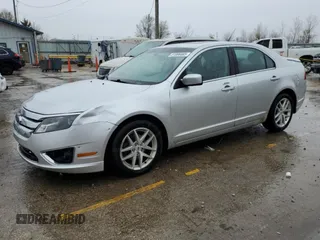 2012 Ford Fusion SEL z VIN 3FAHP0JA3CR156338, wystawiony jako Copart lot #51996885 z przebiegiem 162 892 mil mil oraz Szkody całkowita. Historia ofert i sprzedaży dostępna na DreamBid. Obrazek 1.