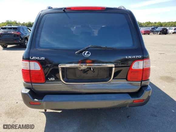 1999 Lexus LX 470 Luxury SUV with VIN JT6HT00W6X0063068, listed as a Copart auction lot 71177514 with NaN miles and Clean Title. Bid and sale history available at carsss.com. Image 6.
