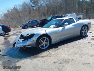 2012 Chevrolet Corvette w/3LT with VIN 1G1YG2DW4C5104807, listed as a IAAI auction lot 41658065 with 74,711 mi miles. Bid and sale history available at carsss.com. Image 2.