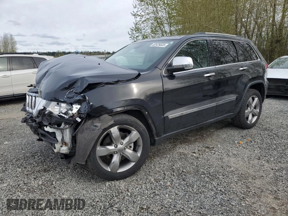 2013 Jeep Grand Cherokee Overland with VIN 1C4RJFCGXDC643802, listed as a Copart auction lot 52429535 with 122,014 mi miles and Salvage Title. Bid and sale history available at carsss.com. Image 1.