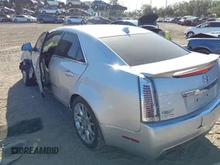2011 Cadillac CTS Performance with VIN 1G6DJ5ED6B0128062, listed as a IAAI auction lot 42150038 with 245,293 mi miles and . Bid and sale history available at DreamBid. Image 3.