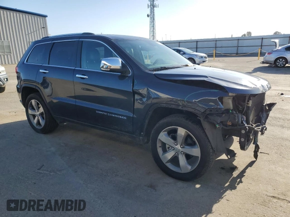 2014 Jeep Grand Cherokee Limited with VIN 1C4RJEBT0EC141553, listed as a Copart auction lot 50835405 with 61,585 mi miles and Salvage Title. Bid and sale history available at DreamBid. Image 4.