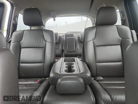 2014 Honda Odyssey Touring with VIN 5FNRL5H95EB083772, listed as a Copart auction lot 56713525 with 215,833 mi miles and Salvage title. Bid and sale history available at DreamBid. Image 10.