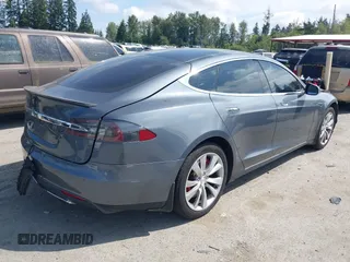 2014 Tesla Model S 60 with VIN 5YJSA1H18EFP38078, listed as a IAAI auction lot 42748619 with 159,285 mi miles and . Bid and sale history available at DreamBid. Image 4.