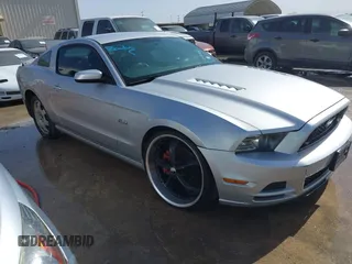 2013 Ford Mustang GT with VIN 1ZVBP8CF7D5216131, listed as a IAAI auction lot 41648862 with 107,983 mi miles. Bid and sale history available at carsss.com. Image 1.