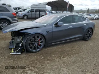 2019 Tesla Model S 100D с VIN 5YJSA1E47KF330777, выставлен на аукционе Copart как лот 50996465 с пробегом Не указан миль и Списание • Salvage title. История ставок и продаж доступна на DreamBid. Изображение 1.