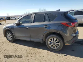 2016 Mazda CX-5 Sport with VIN JM3KE4BY3G0907976, listed as a Copart auction lot 85238414 with 92,933 mi miles and Salvage title. Bid and sale history available at DreamBid. Image 2.
