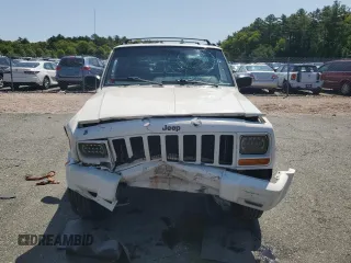 1998 Jeep Cherokee Sport with VIN 1J4FJ68S8WL116368, listed as a Copart auction lot 59228735 with 113,546 mi miles and Salvage title. Bid and sale history available at DreamBid. Image 5.