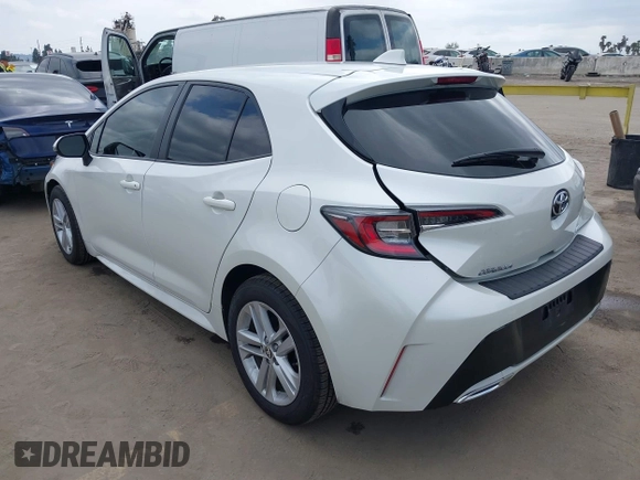 2020 Toyota Corolla Hatchback SE with VIN JTND4RBE3L3077866, listed as a IAAI auction lot 42078596 with 60,153 mi miles. Bid and sale history available at carsss.com. Image 3.