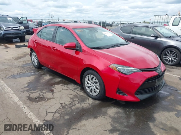 2019 Toyota Corolla L with VIN 5YFBURHE4KP883871, listed as a IAAI auction lot 41979494 with 179,078 mi miles. Bid and sale history available at carsss.com. Image 1.