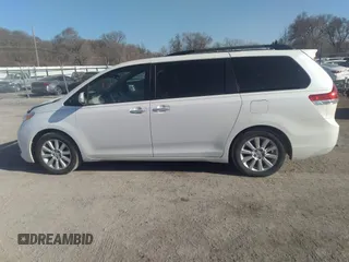 2014 Toyota Sienna XLE with VIN 5TDYK3DC3ES491381, listed as a IAAI auction lot 41803362 with 253,940 mi miles. Bid and sale history available at carsss.com. Image 14.