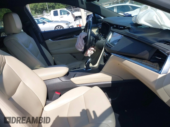 2018 Cadillac XT5 FWD with VIN 1GYKNARS7JZ206816, listed as a IAAI auction lot 42235546 with 94,125 mi miles and . Bid and sale history available at DreamBid. Image 5.