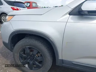 2011 Kia Sorento LX with VIN 5XYKT4A14BG074310, listed as a IAAI auction lot 42119815 with 215,660 mi miles. Bid and sale history available at carsss.com. Image 6.