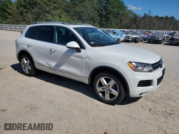 2014 Volkswagen Touareg Lux z VIN WVGEF9BP4ED011436, wystawiony jako Copart lot #74207144 z przebiegiem 207 059 mil mil oraz Szkoda całkowita • Salvage title. Historia ofert i sprzedaży dostępna na DreamBid. Obrazek 4.