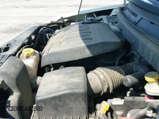 2015 Dodge Journey z VIN 3C4TDCGG7FT712720, wystawiony jako IAAI lot #41967150 z przebiegiem 156 634 mil mil oraz . Historia ofert i sprzedaży dostępna na DreamBid. Obrazek 19.