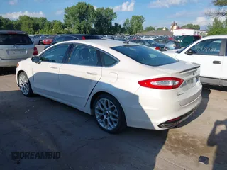 2014 Ford Fusion Titanium with VIN 3FA6P0K95ER128961, listed as a IAAI auction lot 42750668 with 197,188 mi miles and . Bid and sale history available at DreamBid. Image 3.