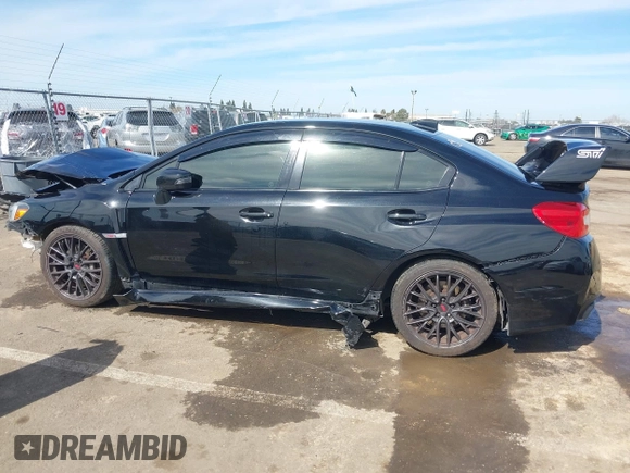 2015 Subaru WRX STI with VIN JF1VA2L68F9824207, listed as a IAAI auction lot 41637409 with 95,332 mi miles and . Bid and sale history available at DreamBid. Image 15.