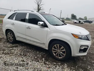 2013 Kia Sorento SX z VIN 5XYKWDA20DG412272, wystawiony jako Copart lot #60263145 z przebiegiem Nie podano mil oraz Czysty tytuł • Clean title. Historia ofert i sprzedaży dostępna na DreamBid. Obrazek 4.