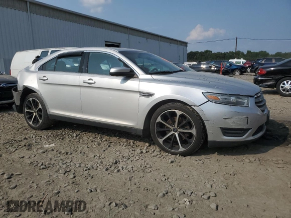 2014 Ford Taurus SEL with VIN 1FAHP2E8XEG184523, listed as a Copart auction lot 67643764 with 157,851 mi miles and Salvage Title. Bid and sale history available at carsss.com. Image 4.