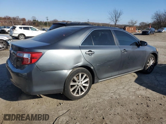 2013 Toyota Camry L with VIN 4T4BF1FK7DR285575, listed as a Copart auction lot 82877124 with 102,946 mi miles and Salvage Title. Bid and sale history available at carsss.com. Image 3.