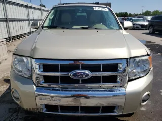 2010 Ford Escape Limited z VIN 1FMCU9EG5AKC49732, wystawiony jako Copart lot #61172415 z przebiegiem 148 796 mil mil oraz Szkoda całkowita • Salvage title. Historia ofert i sprzedaży dostępna na DreamBid. Obrazek 5.