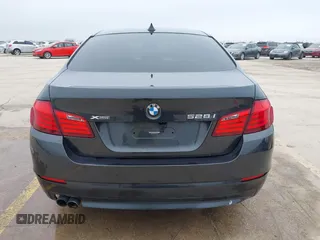 2013 BMW 5 Series 528i xDrive with VIN WBAXH5C50DDW15574, listed as a IAAI auction lot 41572993 with 59,188 mi miles. Bid and sale history available at carsss.com. Image 17.