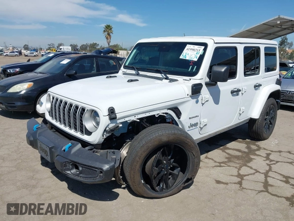 2024 Jeep Wrangler Sahara with VIN 1C4RJXP61RW126904, listed as a IAAI auction lot 41998215 with 32,034 mi miles and . Bid and sale history available at DreamBid. Image 2.