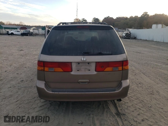 2003 Honda Odyssey LX z VIN 5FNRL18533B084504, wystawiony jako Copart lot #52674495 z przebiegiem 189 256 mil mil oraz Nie do naprawy • Non repairable. Historia ofert i sprzedaży dostępna na DreamBid. Obrazek 6.