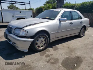 1998 Mercedes-Benz C 230/260/280/320 with VIN WDBHA23G1WA607028, listed as a Copart auction lot 60451414 with 253,477 mi miles and Clean Title. Bid and sale history available at carsss.com. Image 1.