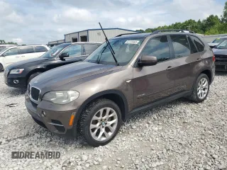 2012 BMW X5 35i with VIN 5UXZV4C51CL748765, listed as a Copart auction lot 62339905 with Not provided miles and Clean title. Bid and sale history available at DreamBid. Image 1.