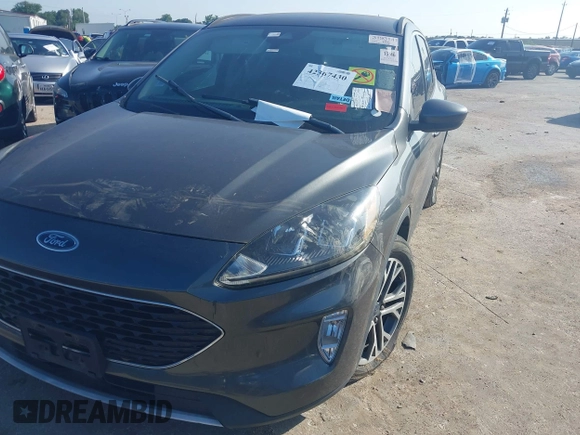 2020 Ford Escape SEL with VIN 1FMCU0H63LUA75262, listed as a IAAI auction lot 42367430 with Not provided miles and . Bid and sale history available at DreamBid. Image 6.