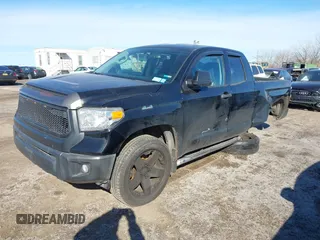 2016 Toyota Tundra 4WD Truck SR with VIN 5TFUM5F16GX064418, listed as a IAAI auction lot 41504912 with 215,241 mi miles. Bid and sale history available at carsss.com. Image 20.
