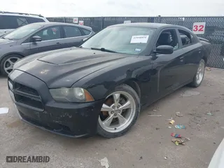 2013 Dodge Charger SXT Plus with VIN 2C3CDXHG4DH574361, listed as a IAAI auction lot 42048854 with 178,735 mi miles. Bid and sale history available at carsss.com. Image 2.