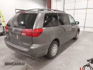 2005 Toyota Sienna CE with VIN 5TDZA23C15S290369, listed as a IAAI auction lot 42143101 with 248,825 mi miles. Bid and sale history available at carsss.com. Image 4.