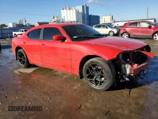 2009 Dodge Charger R/T with VIN 2B3KA53T29H601347, listed as a Copart auction lot 85950514 with 154,725 mi miles and Salvage Title. Bid and sale history available at carsss.com. Image 4.