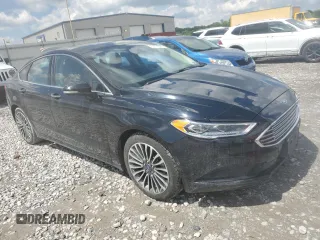 2018 Ford Fusion SE z VIN 3FA6P0LU6JR273861, wystawiony jako Copart lot #55722005 z przebiegiem 127 633 mil mil oraz Szkoda całkowita • Salvage title. Historia ofert i sprzedaży dostępna na DreamBid. Obrazek 4.