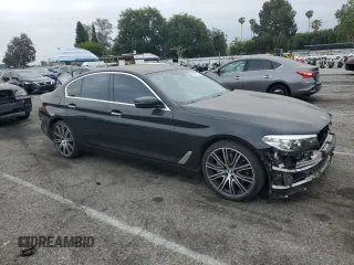 2017 BMW 5 Series 540i with VIN WBAJE5C33HG915675, listed as a Copart auction lot 55857135 with 57,330 mi miles and Salvage title. Bid and sale history available at DreamBid. Image 4.